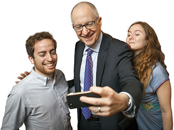 President David Skorton takes a selfie with students